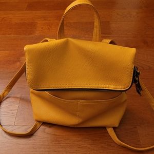 Yellow faux leather back pack style purse NWOT